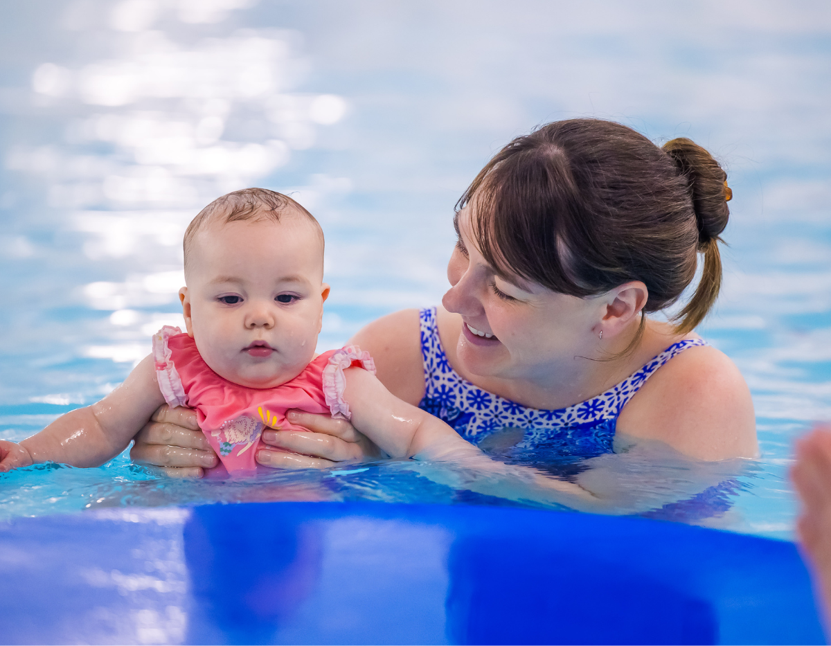 8 A mum and baby enjoy a swimming lesson together